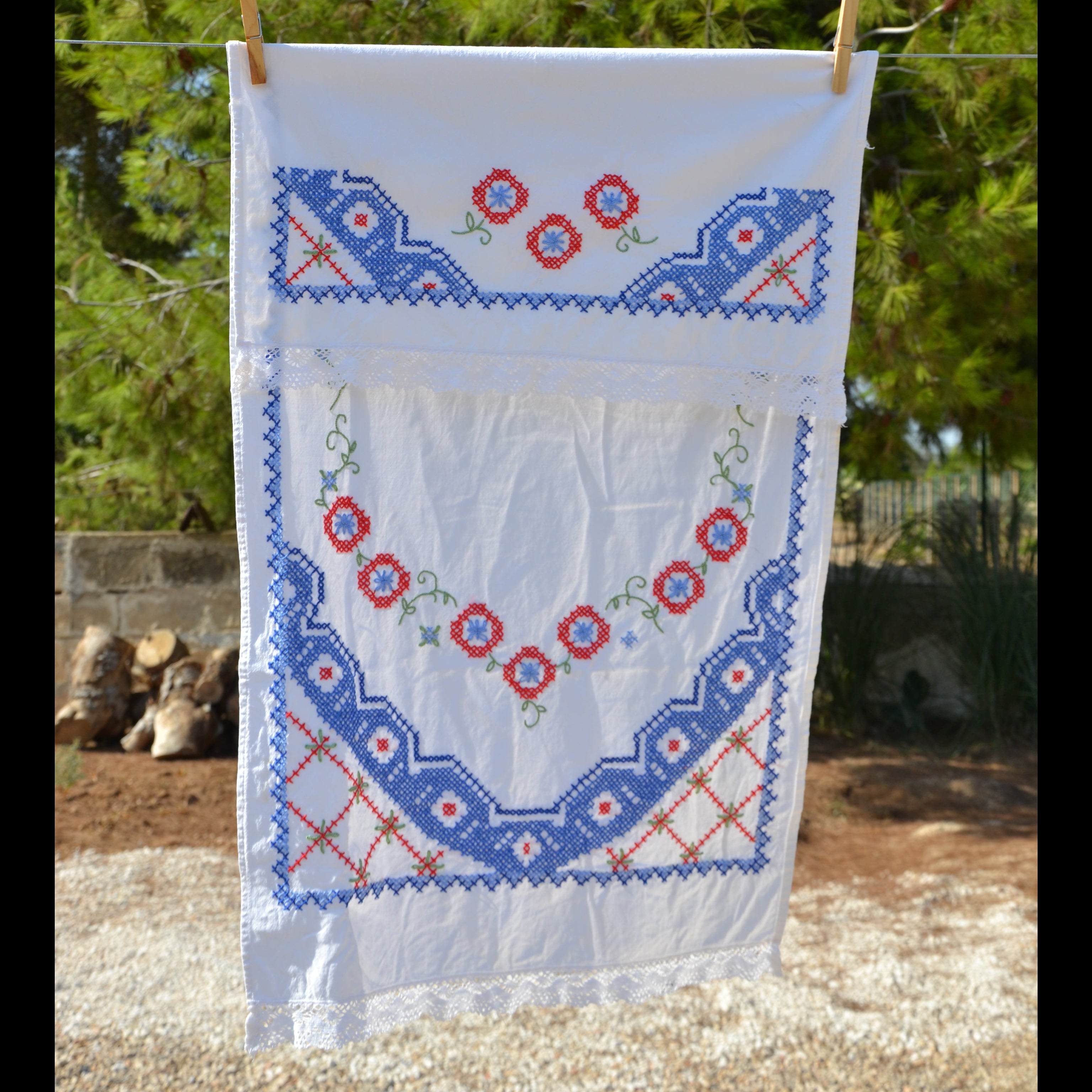 Vintage embroidered Italian tea towel with blue and red detailing
