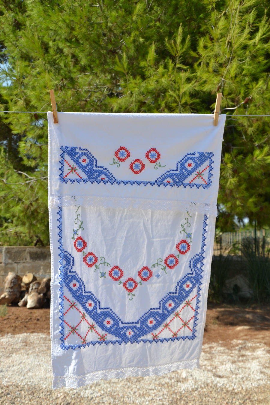 Vintage embroidered Italian tea towel with blue and red detailing