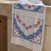 Vintage Italian embroidered tea towel in blue and red, sourced in Puglia